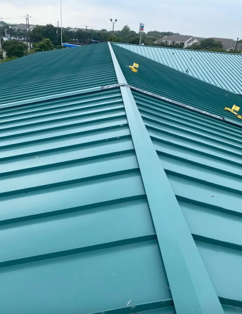 Green commercial metal roof ridge and valley for Metal Roof Repair in Craig